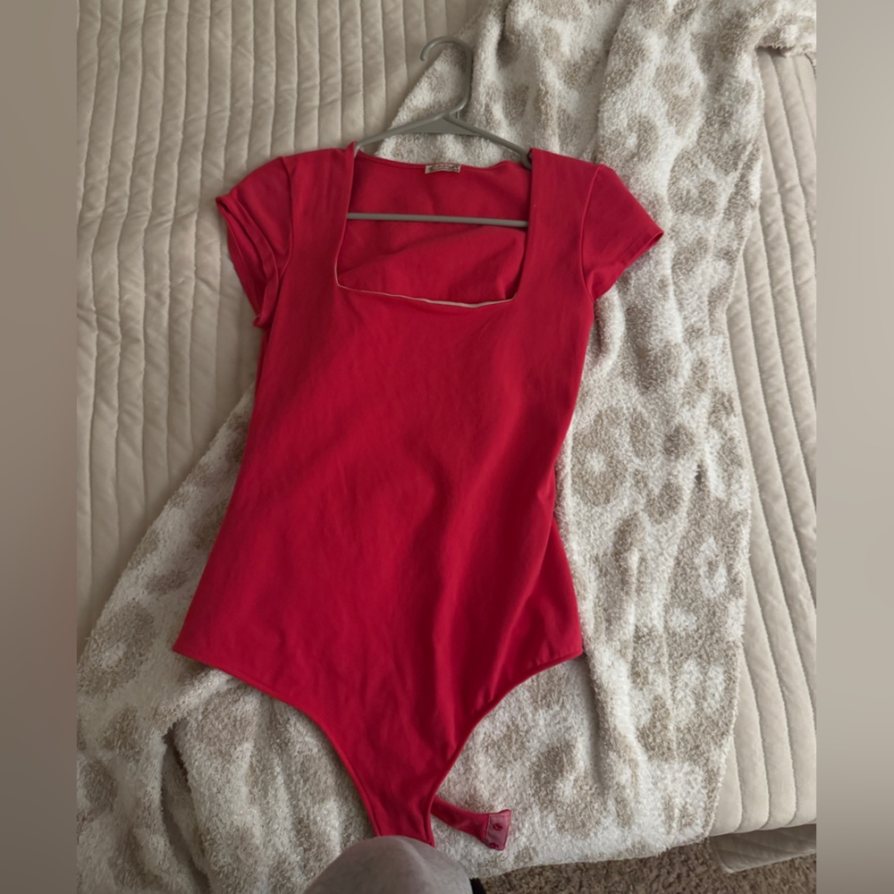 pink free people bodysuit
